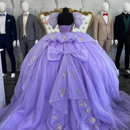 WQ1052 - Gorgeous Ball Gown Sweetheart Neck Puffy Sleeves Lace Appliques Bow Knot Sweep Train Lavender Tulle Quinceanera Dress for Sweet 16